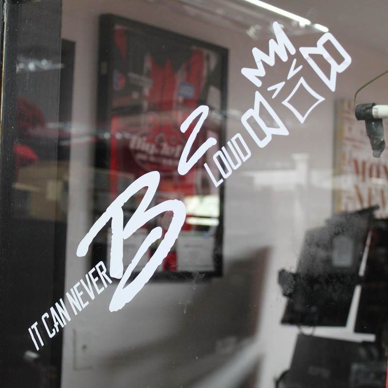 B2 Audio “It Can Never B2 Loud” / Riot Guy White 5″ x 20″ Vinyl Sticker